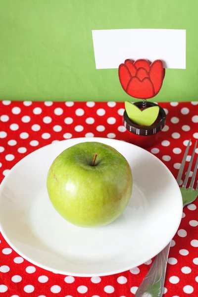 Green apple for breakfast clothespin with card for text — Stock Photo, Image