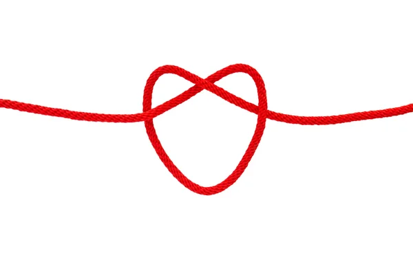 Kalp şekli kırmızı ip üzerinden — Stok fotoğraf