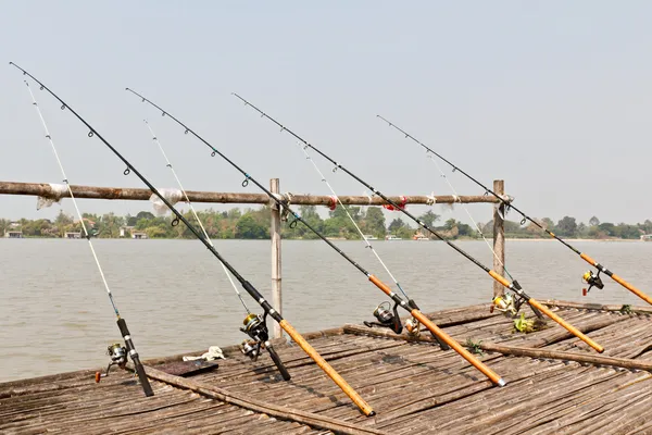Fishing Poles on Pier — Stock Photo, Image