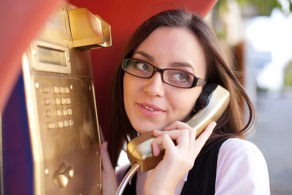 Young girl call from gold street phone — Stock Photo, Image