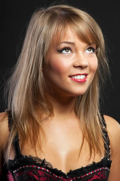 Jonge sexy vrouw in korset close-up portret — Stockfoto