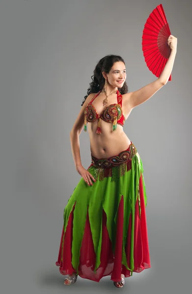 Girl in oriental arabian costume with fan — Stock Photo, Image