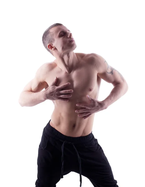 Athletischer Mann posiert nackt auf weißer Isolation — Stockfoto