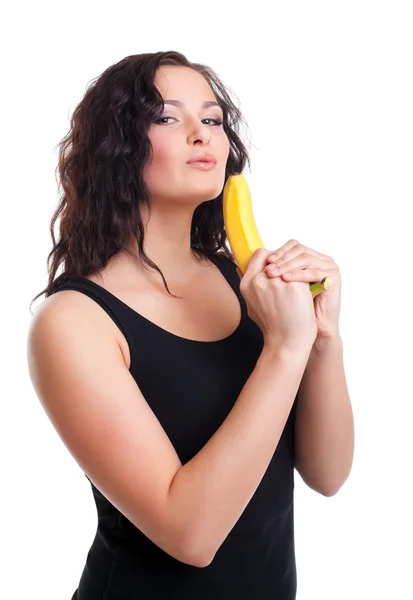 Woman with fruit gun look at camera — Stock Photo, Image