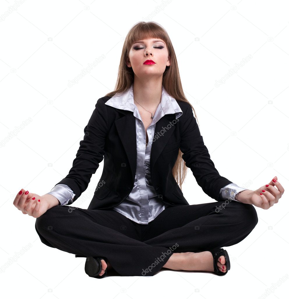 Yong business woman sit in yoga pose