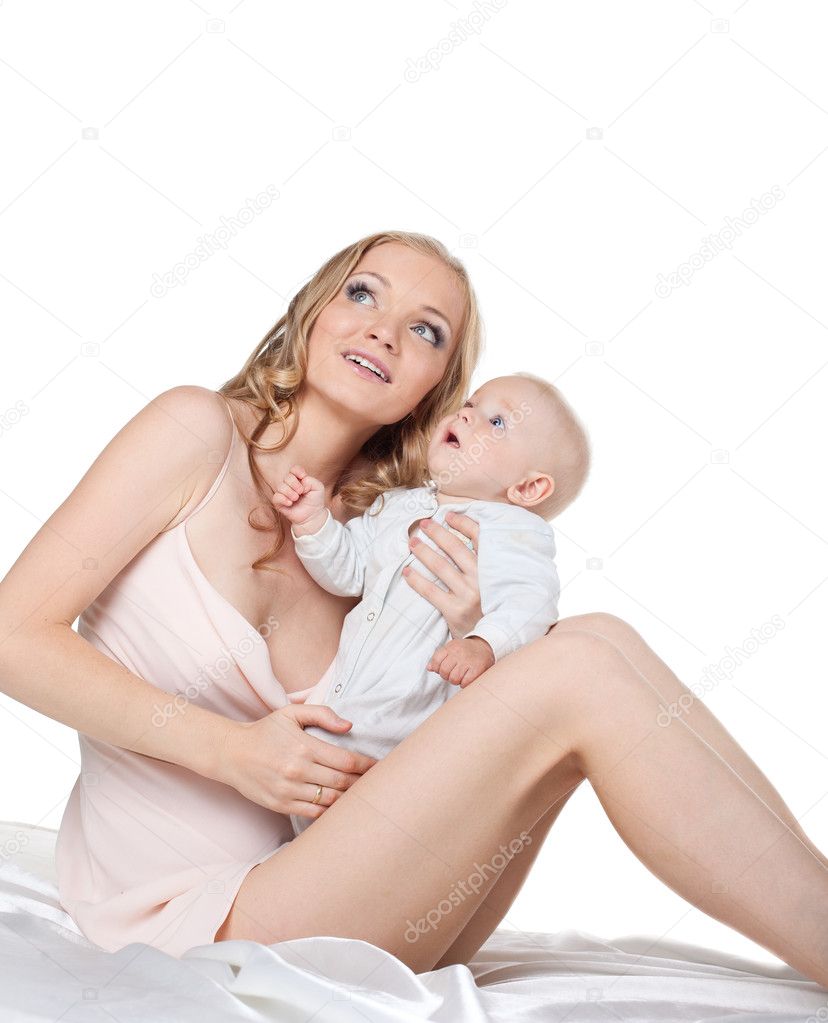 Beauty young mother with child look at light
