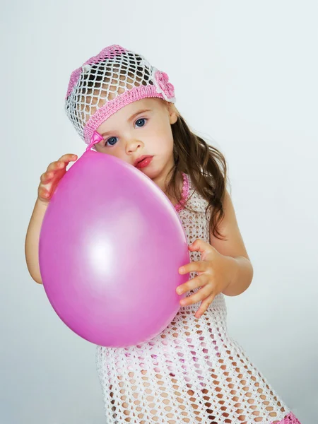 Kind mit Luftballons — Stockfoto