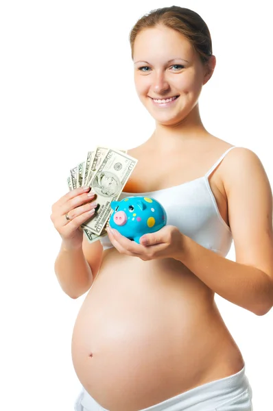 Mulher grávida com um banco porquinho — Fotografia de Stock