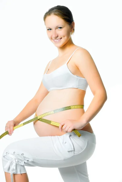 Kobieta w ciąży pomiar brzucha — Zdjęcie stockowe