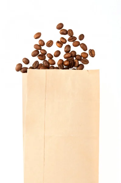 Coffee poured from a brown package — Stock Photo, Image