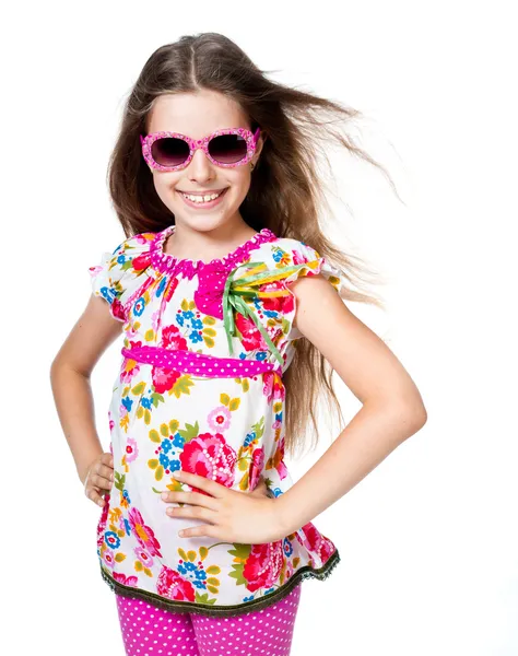 Menina bonito com óculos de sol rosa — Fotografia de Stock