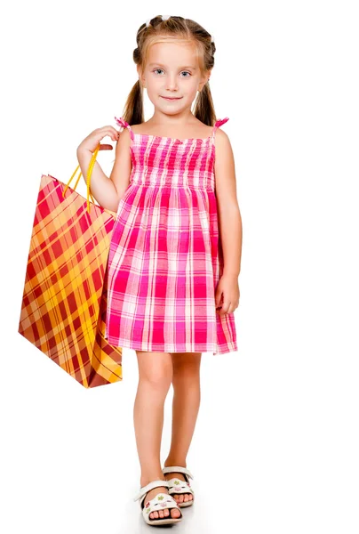 Paketi ile küçük kız — Stok fotoğraf