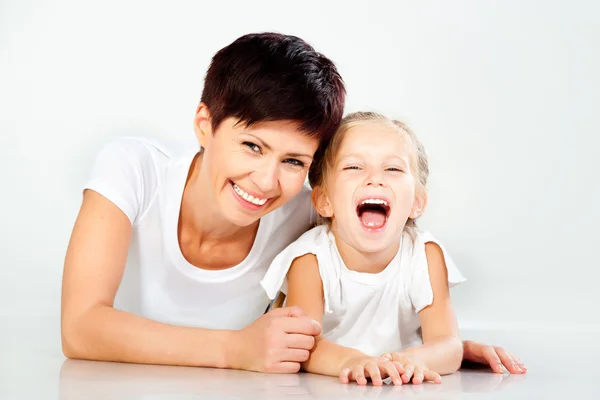 Mother and daughter laughing Stock Photo