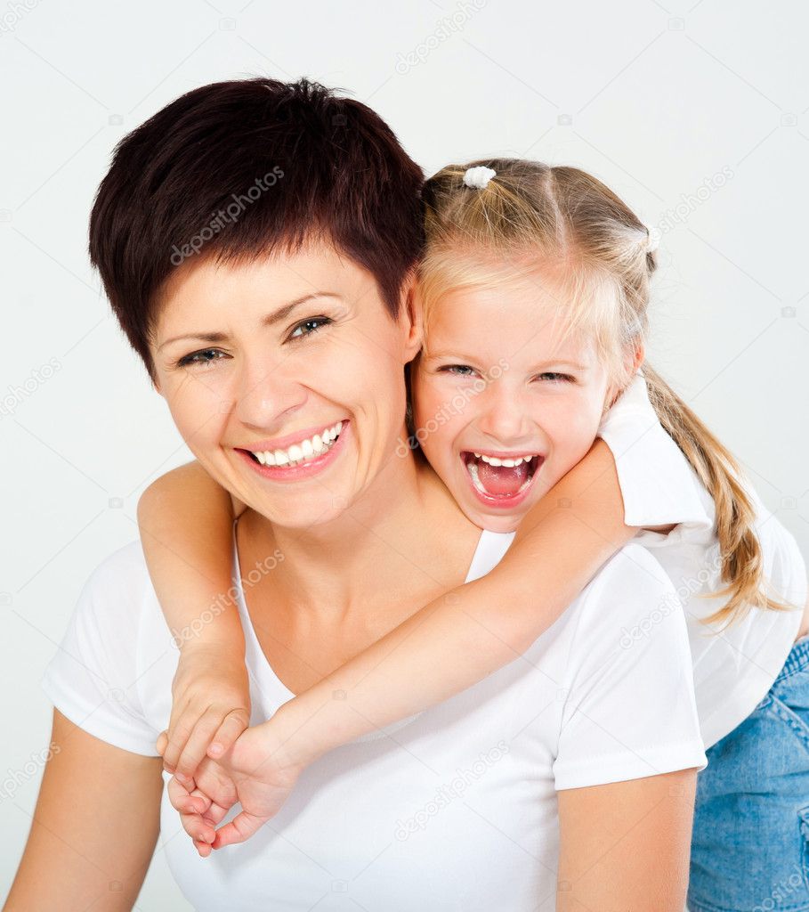 Mother and daughter laughing