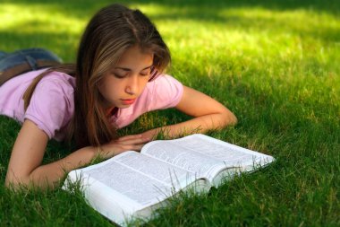 Young girl with the book clipart