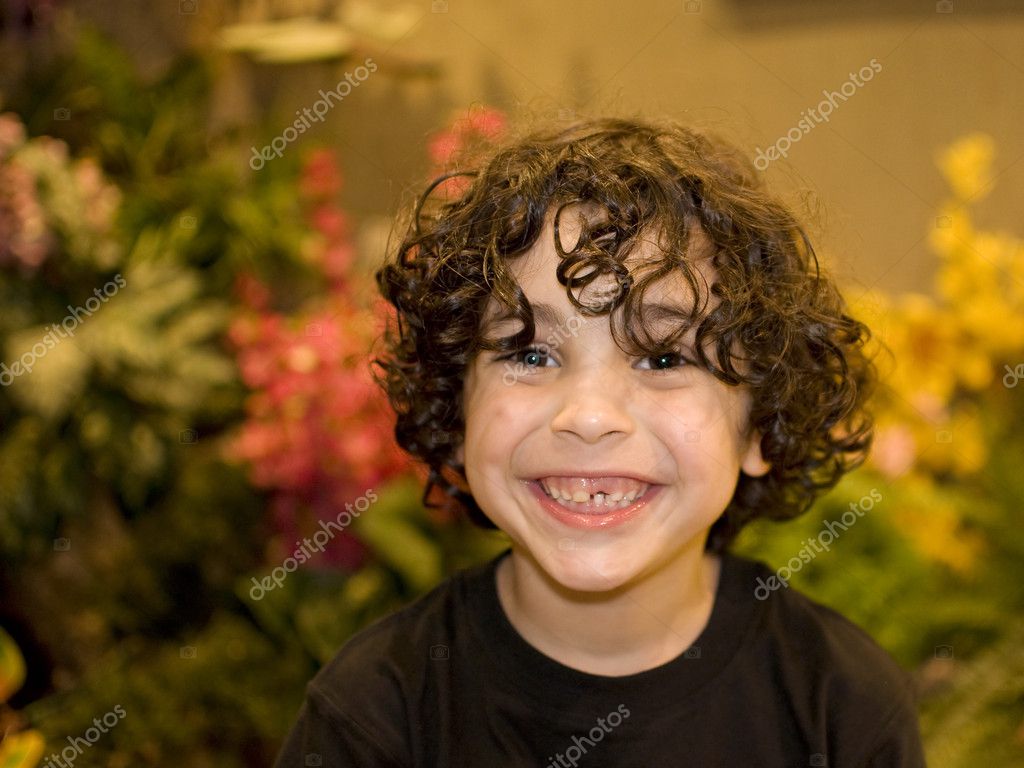 A Cute Latin Boy Smiling — Stock Photo © yelo34 #5935771