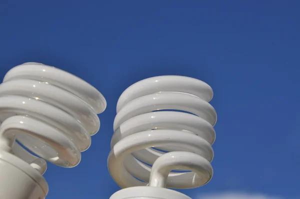 Save energy bulb with blue sky — Stock Photo, Image