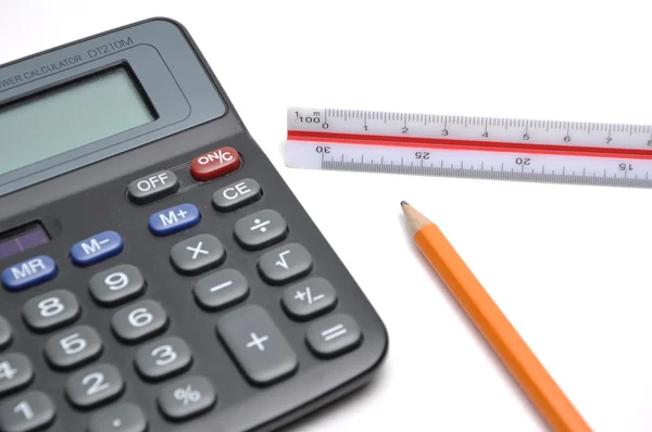 Ołówek, kalkulator i władcy — Zdjęcie stockowe