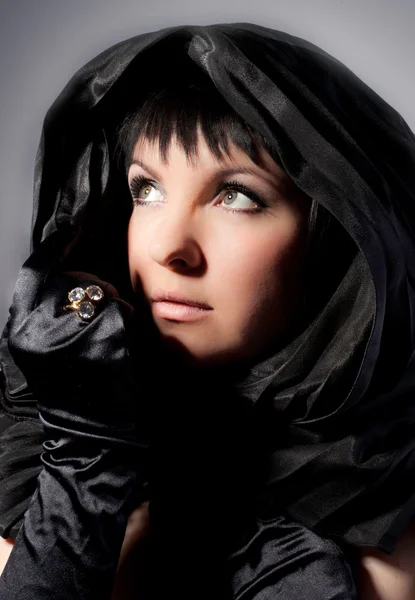 Girl in a black hood — Stock Photo, Image