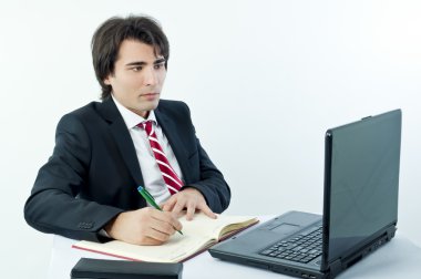 Genç işadamı not alıyor