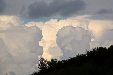 Beautiful cumulonimbus clouds forming in scenic Saskatchewan clipart
