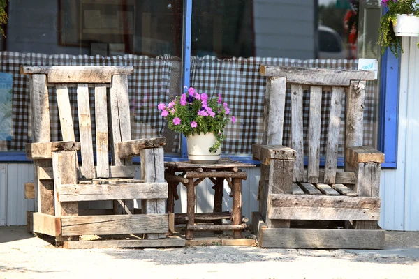 stock image Two wooden chair outside a Saskatchewan building