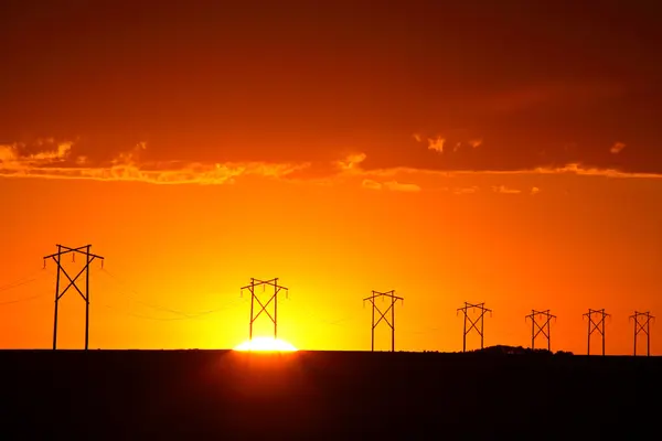 Gorgeous sunset behind Saskatchewan power towers — Stock Photo, Image