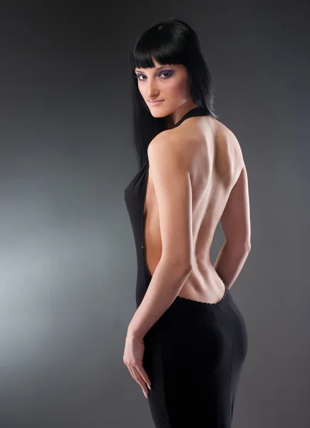 Retrato de sexy ásia jovem mulher no preto vestido — Fotografia de Stock