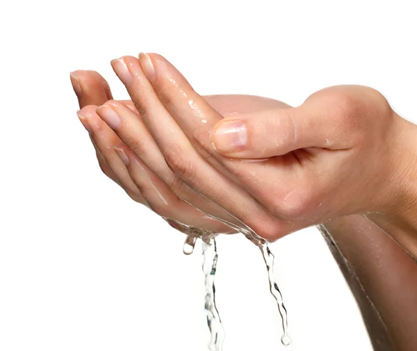 Water in de palmen van de handen — Stockfoto