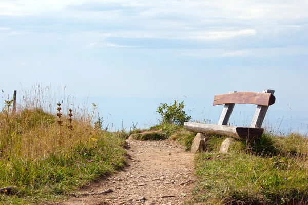 stock image Old rustic bench in the countryside