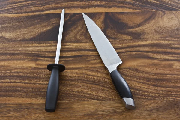 Knife and sharpener — Stock Photo, Image