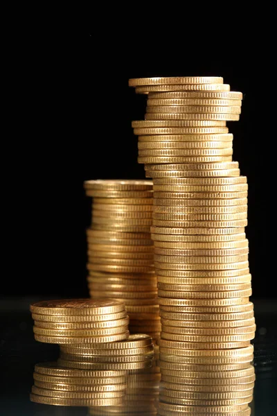 Coins on black — Stock Photo, Image