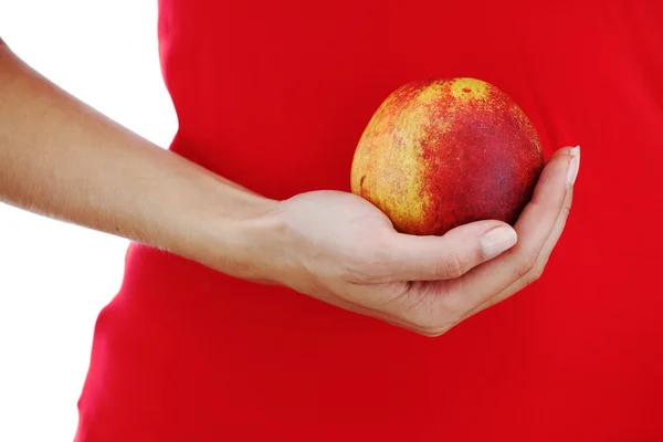 Peach in woman hands — Stock Photo, Image