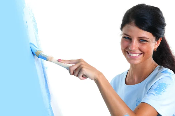 Žena malování na zdi — Stock fotografie