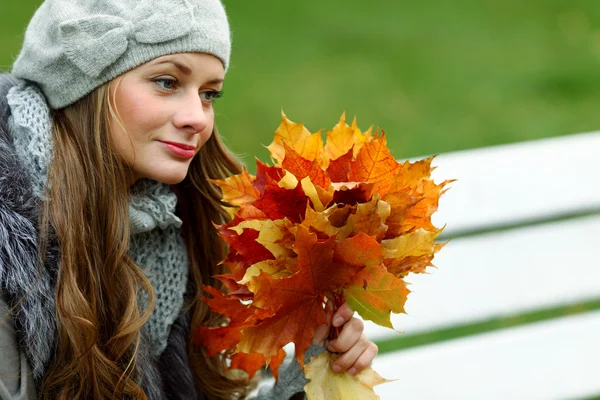 Woman portret in autumn leaf Stock Picture
