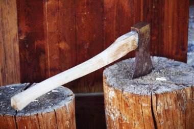 Axe in wood clipart