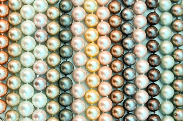 A lot of pearl beads close up — Stock Photo, Image