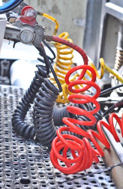 Colorful Pneumatic hoses between the truck and trailer clipart