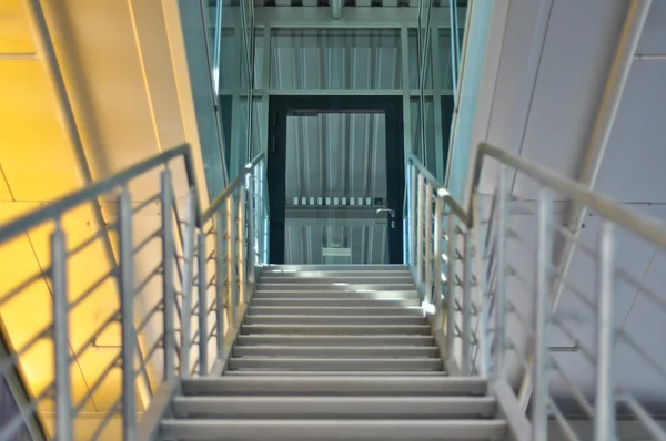 Stairs and a glass door — Stock Photo, Image