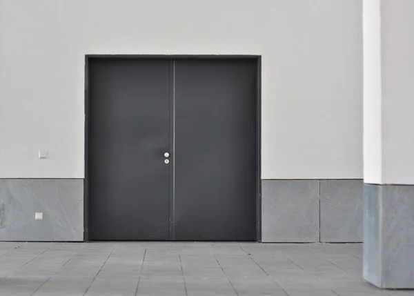 Dark gray double metal door — Stock Photo, Image