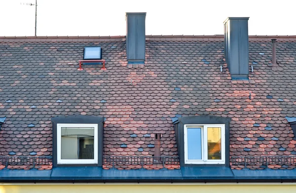 stock image Tiled roof with windows