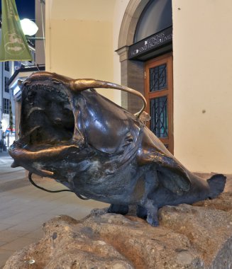 Fish statue in front of the museum of hunting and fishing. munich. germany clipart