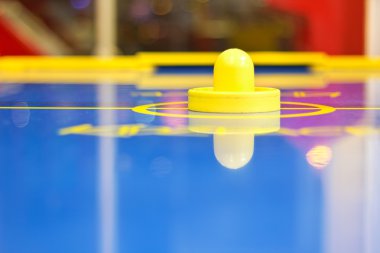 Yellow air hockey mallet clipart