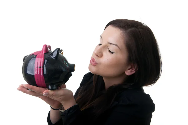 Young woman piggybank kiss Stock Picture