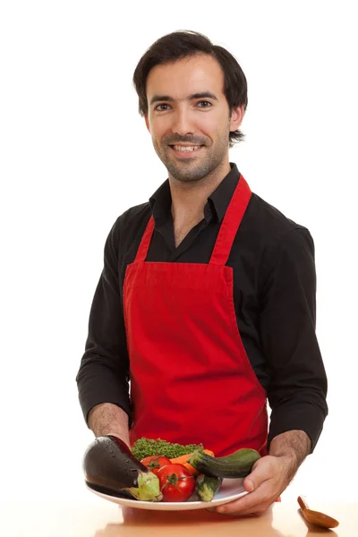 Chef presentando verduras — Foto de Stock