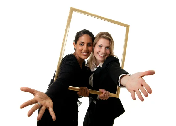 Twee vrouwelijke ondernemers pictureframe Stockfoto