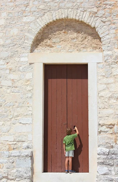 stock image In front of an old door