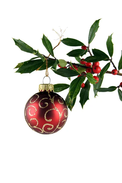 Holly a červený ornament — Stock fotografie
