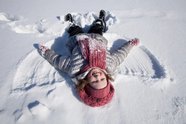 A girl on snow — Stock Photo, Image