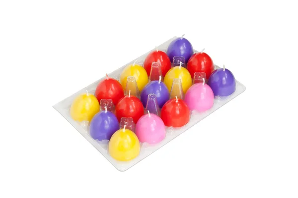 Easter candles in the shape of eggs on the white background — Stock Photo, Image